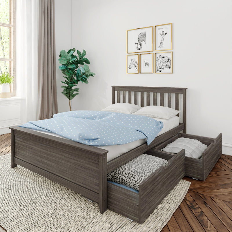Grey wood storage bed with under-bed drawers, blue polka-dot duvet and white pillows in a modern sunlit bedroom with hardwood floor and indoor plant