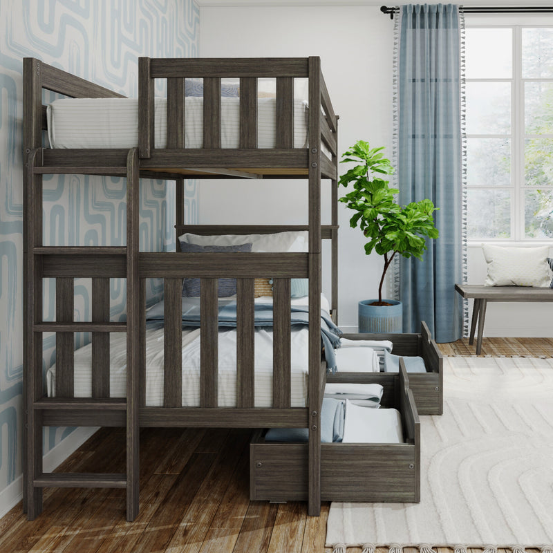 Gray wooden twin-over-twin bunk bed with built-in under-bed storage drawers in a modern kids' bedroom with blue patterned wallpaper, light blue curtains, potted plant, bench by a large window and hardwood floors