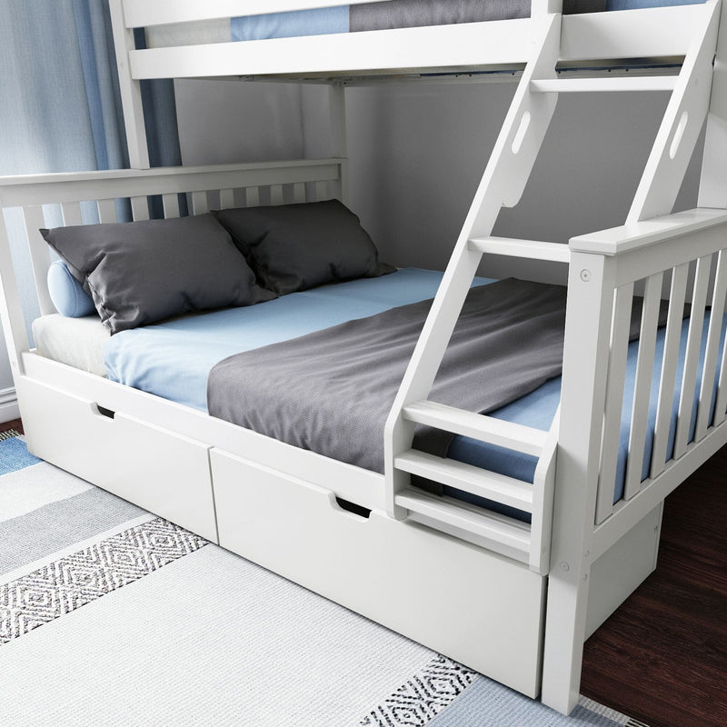White wooden bunk bed with ladder and under-bed storage drawers, full-size lower bed and twin upper with blue and gray bedding in a modern kids' bedroom on hardwood floor and patterned area rug