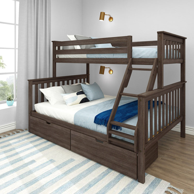 Dark wood twin-over-full bunk bed with ladder and under-bed storage drawers, blue and gray bedding, brass wall sconces, light gray curtains and hardwood floor in a modern kids' bedroom