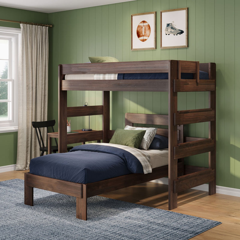 Dark walnut twin-over-twin bunk bed in kids' bedroom with green shiplap wall, navy bedding, study desk and framed sports artwork