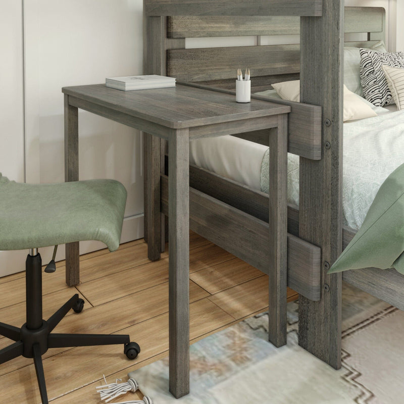 Gray wooden loft bed with built-in desk and green swivel stool, space-saving small bedroom workspace on hardwood floor with pillows and rug