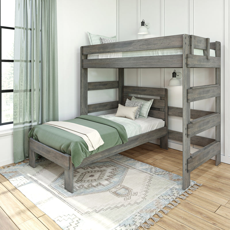 Rustic gray wooden bunk bed with green bedding, patterned pillows, wall sconces and sheer curtains in a modern farmhouse kids bedroom