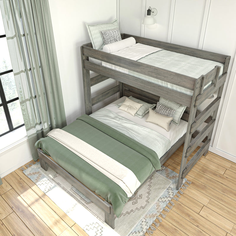 Modern farmhouse grey wooden bunk bed with green duvet, patterned pillows, sheer curtains and hardwood floor in a bright cozy bedroom