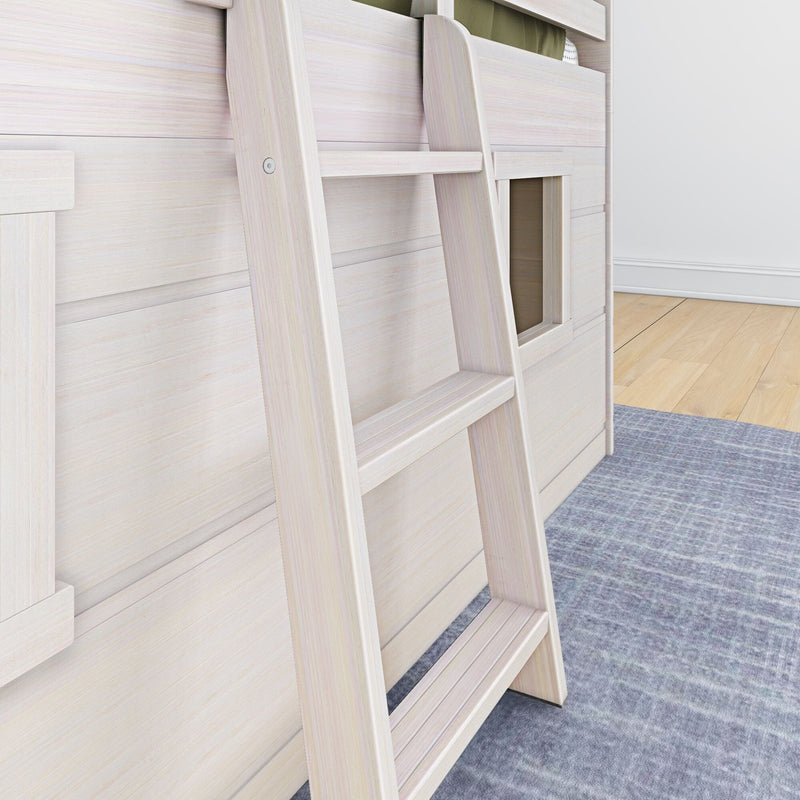 Close-up of a whitewashed wooden ladder attached to a modern bunk/loft bed in a children's bedroom with hardwood floors and a blue area rug