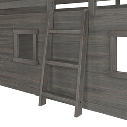 Gray wooden ladder attached to rustic bunk bed with wooden paneling and window cutouts.