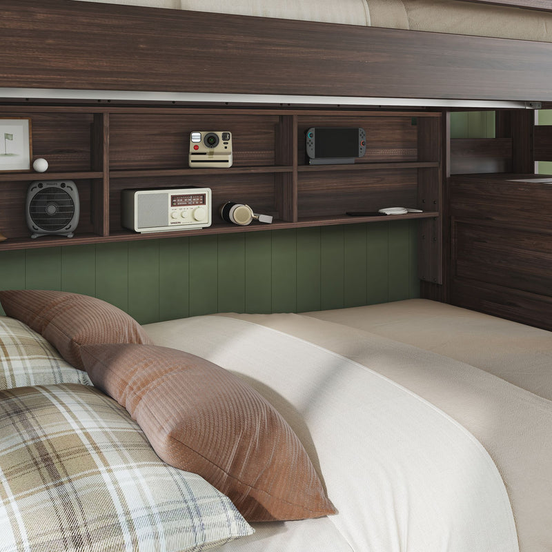 Cozy bedroom with dark wood built-in shelving headboard, green accent wall, beige bedding, plaid and brown pillows, retro radio, instant camera, handheld gaming console and headphones