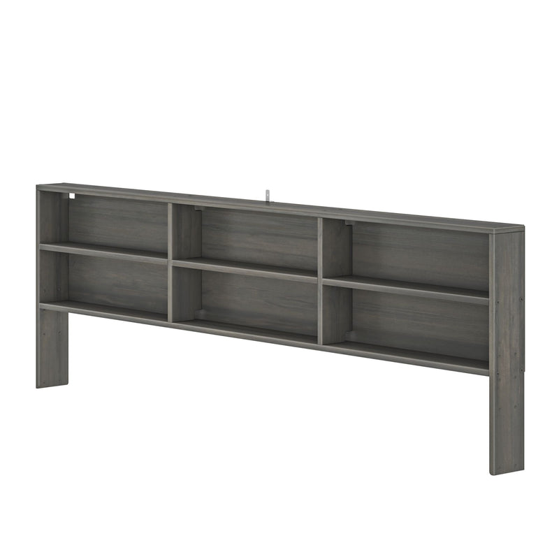 Gray wooden wall-mounted headboard with built-in open bookshelf and multiple storage shelves for bedroom