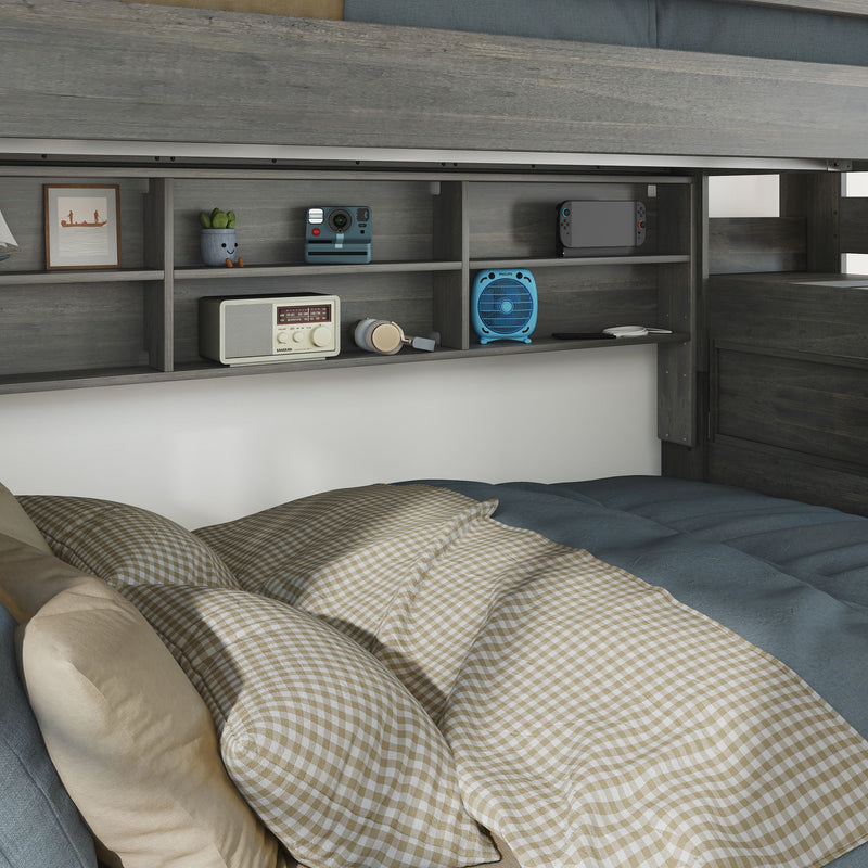 Cozy modern loft bed with built-in gray shelving, blue quilt, beige gingham pillows, retro radio, Polaroid camera, fan, headphones, game console