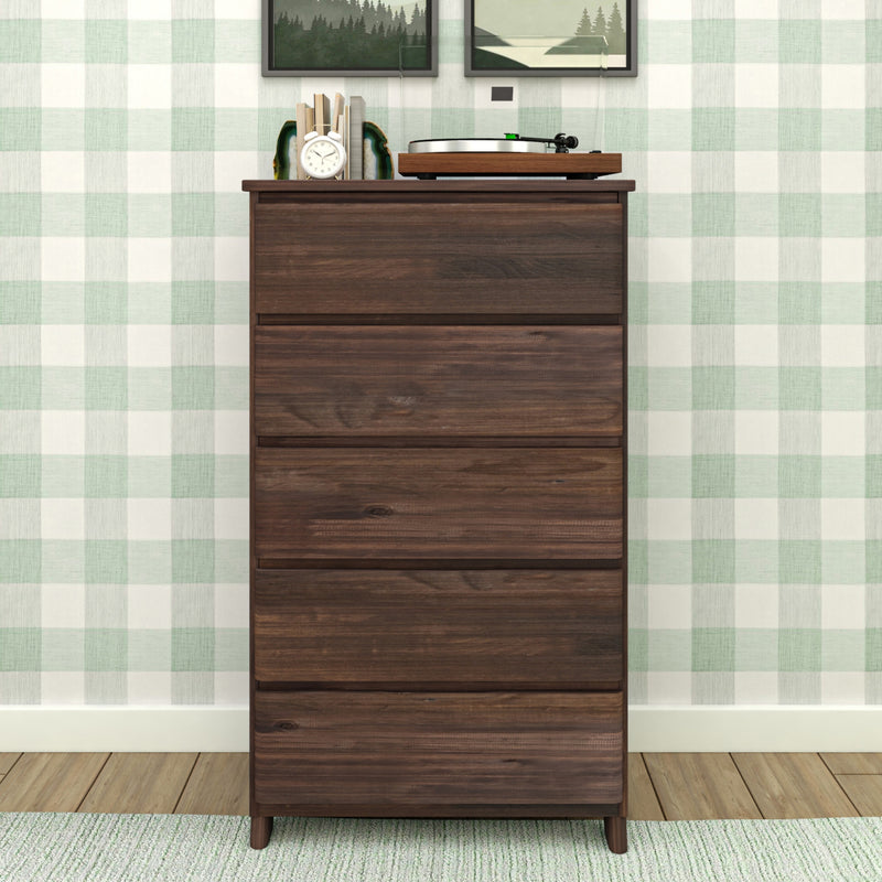 Mid-century modern walnut five-drawer tall dresser with record player, alarm clock and books on top against green buffalo-check wallpaper