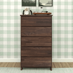Mid-century modern wooden dresser with five drawers and a turntable on top, set against a checkered green wallpaper background.