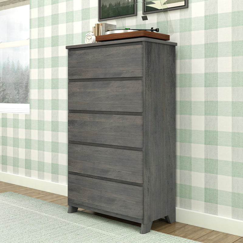 Tall gray wooden dresser with vinyl turntable and alarm clock against mint green buffalo-check wallpaper, hardwood floor and light green rug in a modern farmhouse bedroom