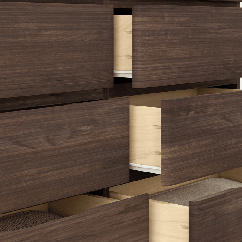 Open wooden dresser drawers in dark brown finish, perfect for bedroom storage solutions.