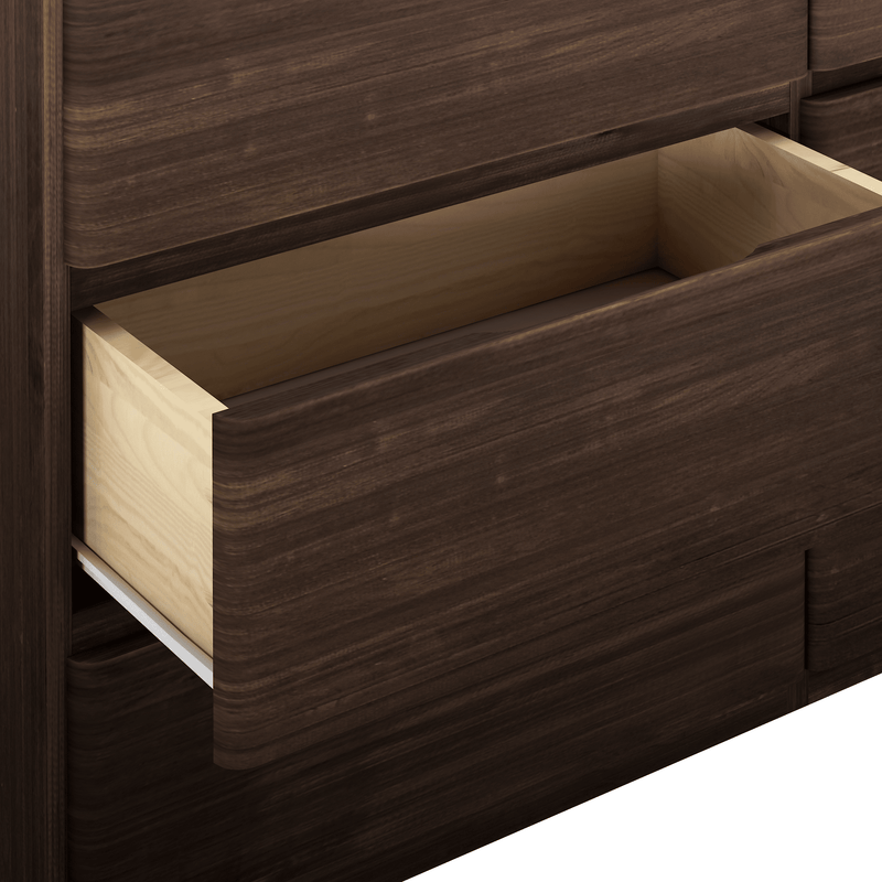 Close-up of open dark wood dresser drawer with light wooden interior and metal drawer slides, modern bedroom storage furniture