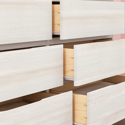Open white wooden dresser drawers with visible shelves and contents.