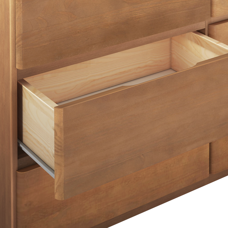 Close-up of open wooden dresser drawers showing natural wood grain, light pine interior, and metal drawer slides