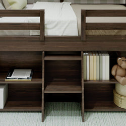 Dark wood bunk bed with built-in shelves and books, featuring a stuffed toy, ideal for children's bedroom storage solutions.