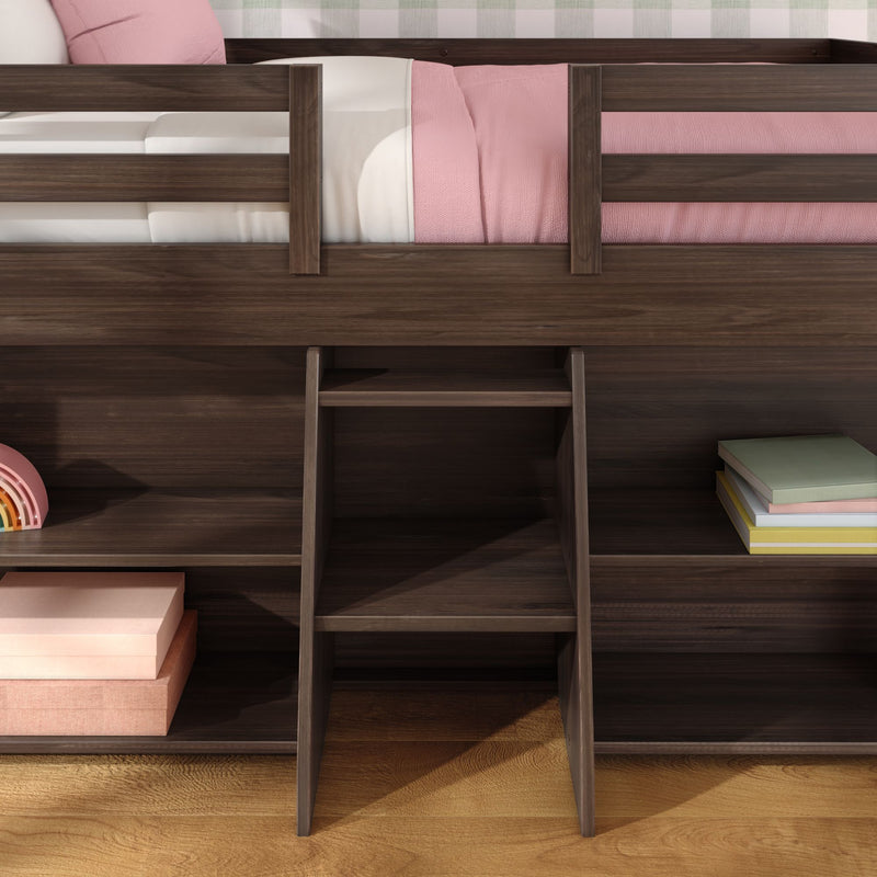 Dark wood kids' loft bed with built-in ladder and open storage shelves, pink bedding and toys in a modern child's bedroom