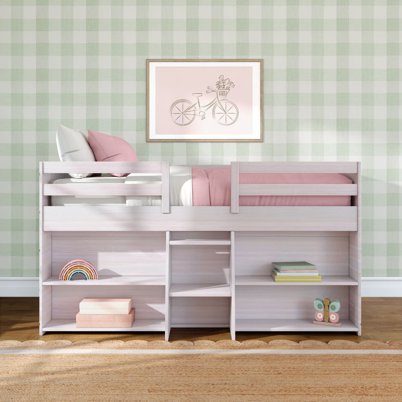 White wooden loft bed with storage shelves, pink bedding and toys in a kids' bedroom with green gingham wallpaper