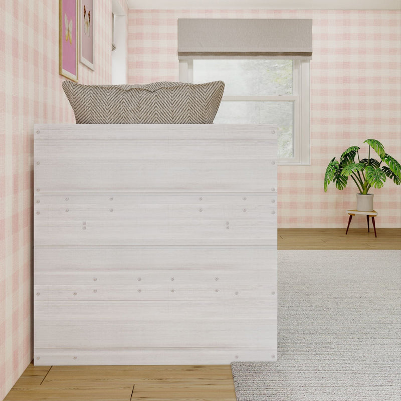 Cozy kids bedroom with wooden loft bed, pink plaid wallpaper, and indoor plant.