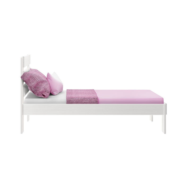 White wooden twin bed frame styled with pastel pink fitted sheet, textured pink pillows and matching throw blanket — pink bedding for kids' bedroom