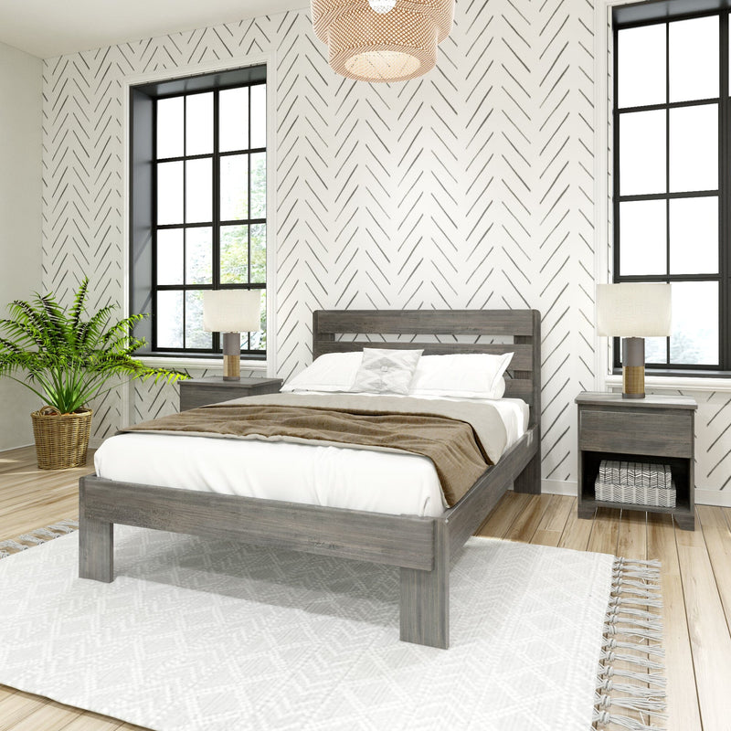Modern farmhouse bedroom with gray wood bed and nightstands, neutral bedding, herringbone-patterned wallpaper, black-framed windows, woven pendant light and potted fern