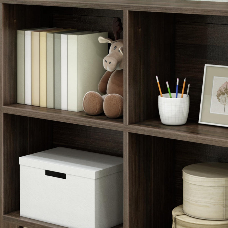 Cozy home office shelf with books, plush toy, and organized stationery in neutral tones.
