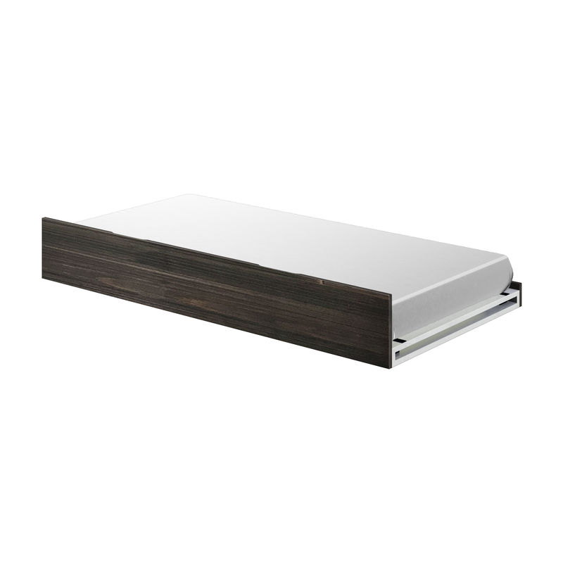Side view of a modern dark wood platform bed with white mattress and pull-out trundle underbed storage minimalist bedroom furniture