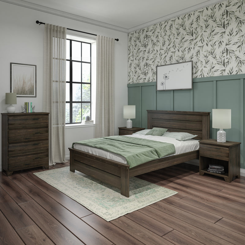 Cozy modern farmhouse bedroom with dark wood platform bed and matching nightstands, green paneled accent wall with botanical wallpaper, hardwood floors, light patterned rug, floor-to-ceiling window with beige curtains and bedside lamps