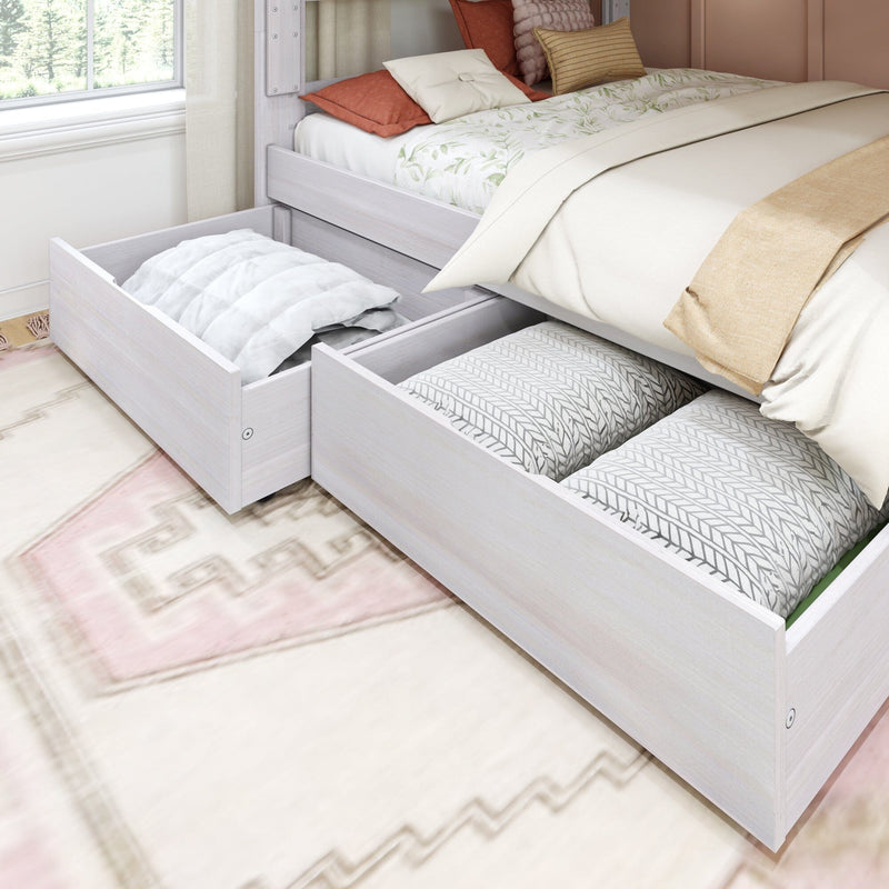 White wood platform bed with two under-bed storage drawers open, holding pillows and comforter — space-saving bedroom storage solution
