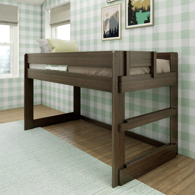 Dark wood twin loft bed with built-in ladder and guardrails in a child's bedroom with green plaid wallpaper, hardwood floor and nature wall art
