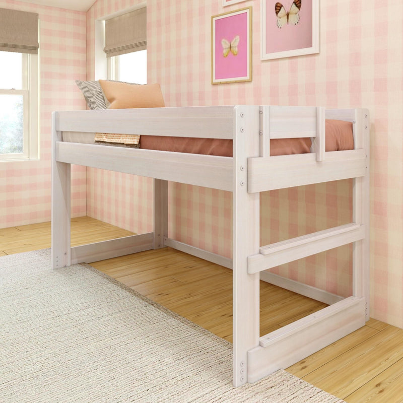 White wooden twin loft bed in pink gingham girls' bedroom, space-saving elevated bed with ladder, hardwood floor, beige rug and butterfly wall art