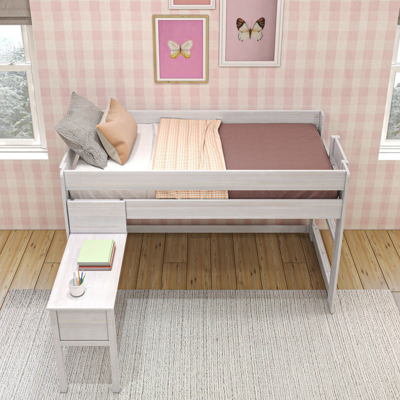 Children's pink plaid bedroom with white loft bed, pink and brown bedding, patterned pillows, framed butterfly wall art and a study bench with books