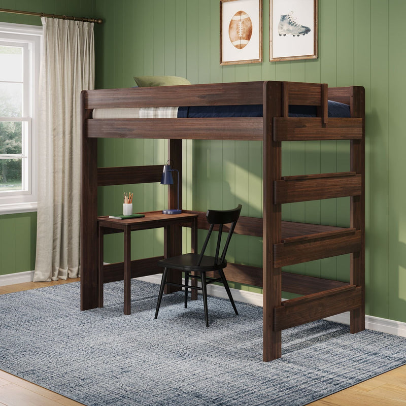 Solid walnut twin loft bed with built-in desk and black chair, space-saving loft bed for kids' bedroom with green paneled wall, blue desk lamp and window