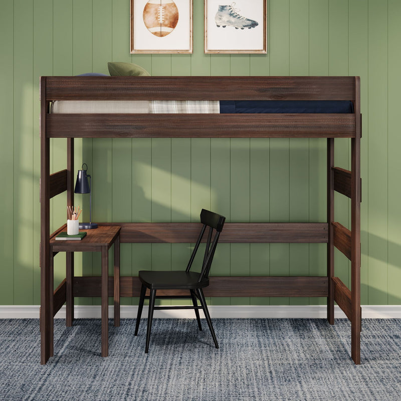 Dark walnut loft bed with built-in desk and black chair against green paneled wall, desk lamp and sports wall art, modern kids/teen bedroom workspace