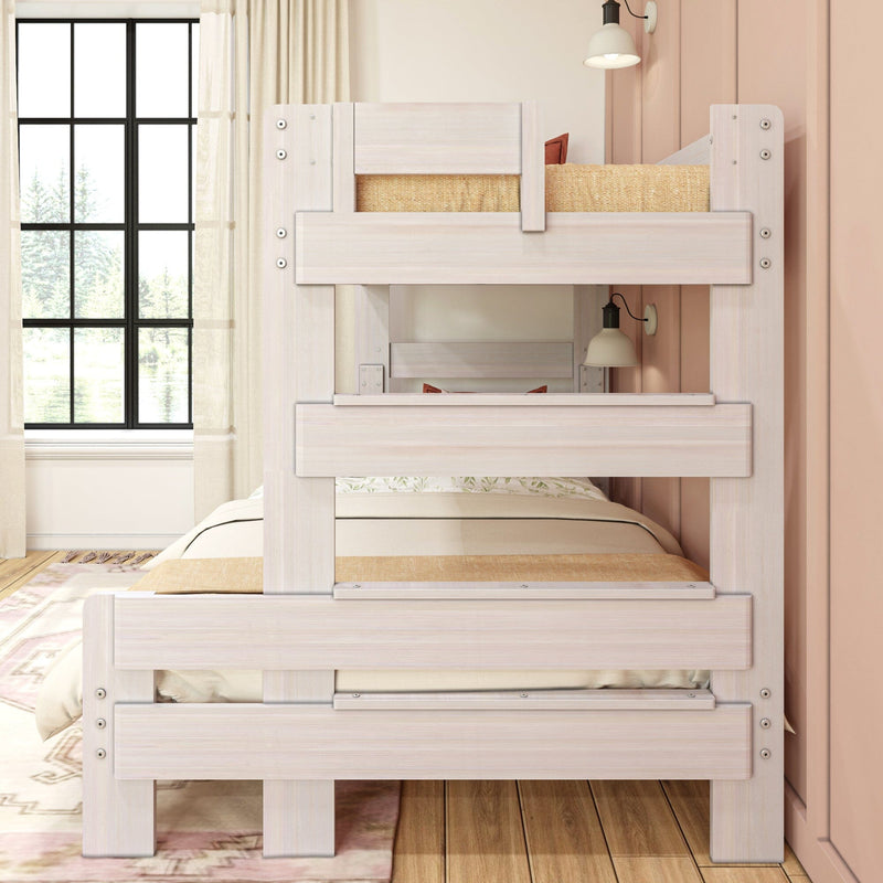 Whitewashed wooden bunk bed in a soft pink kids' bedroom with natural bedding and black grid window