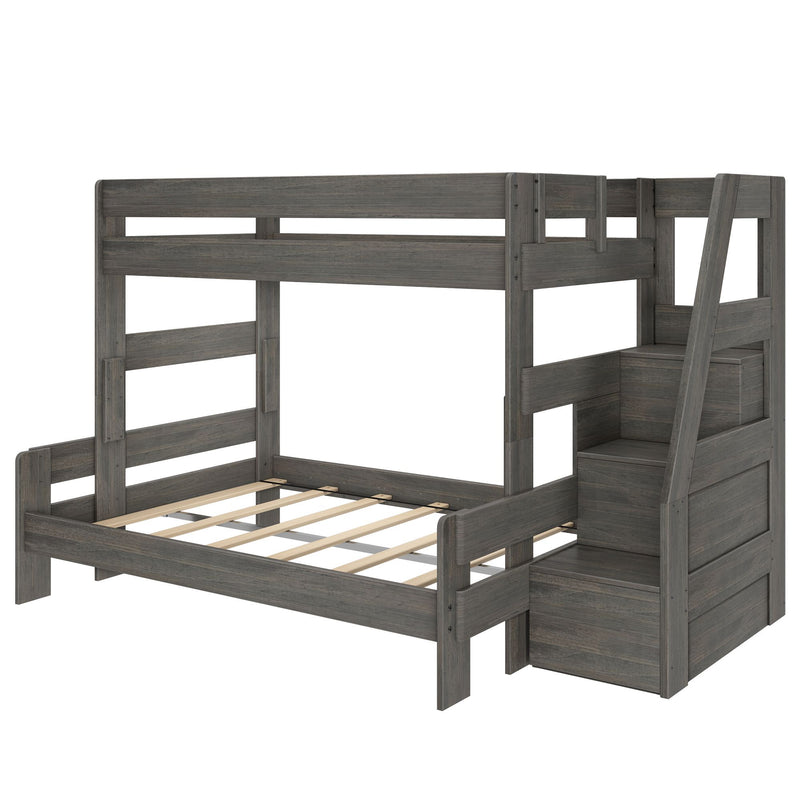 Twin-over-full grey wood bunk bed with built-in staircase storage drawers, slatted mattress support, safety rails and modern farmhouse finish for kids' bedroom