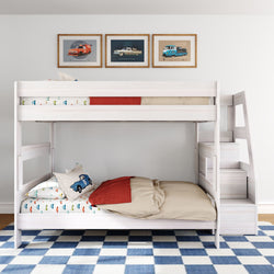 White twin-over-twin bunk bed with built-in staircase storage, car-themed bedding and vintage car wall art on a blue checkered rug in a modern kids' bedroom — space-saving children's bunk bed