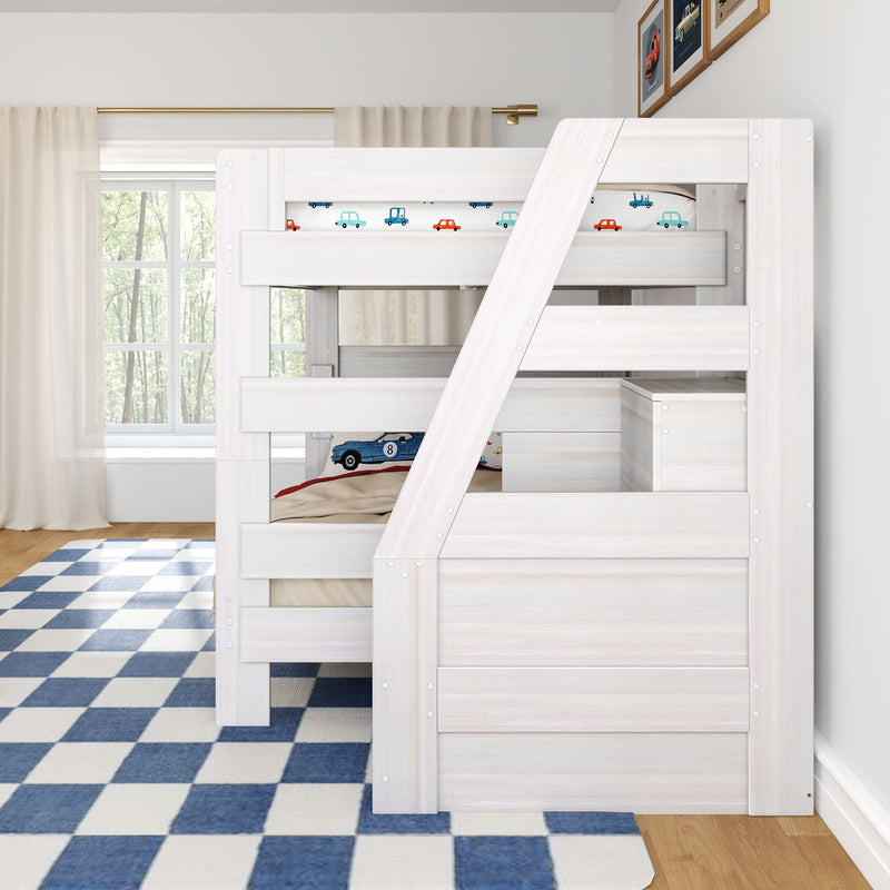 White wooden bunk bed with built-in storage stairs in a bright children's bedroom with car-themed bedding, blue checkered rug and hardwood floor