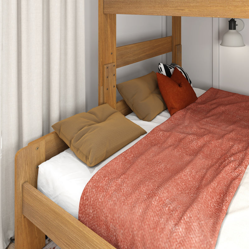Cozy modern bedroom with wooden bed frame, rust-red textured blanket, mustard and patterned pillows, white wall sconce and beige curtains