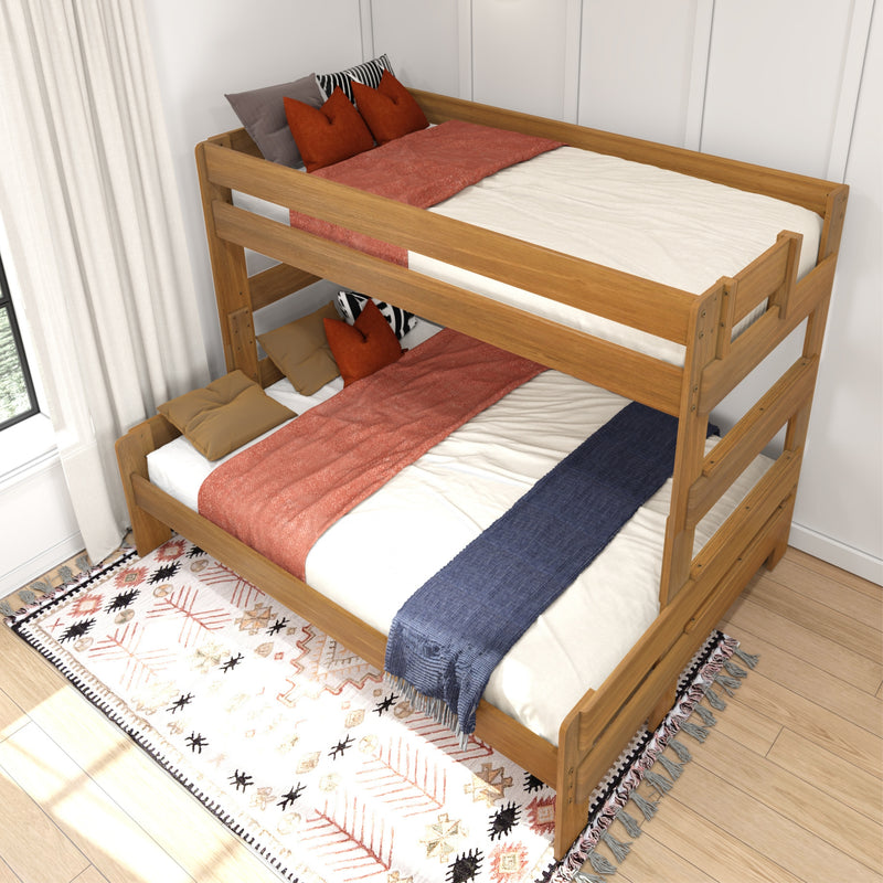Wooden twin-over-full bunk bed with cream bedding, rust-red throws, navy runner and decorative pillows on a patterned rug in a sunlit modern bedroom
