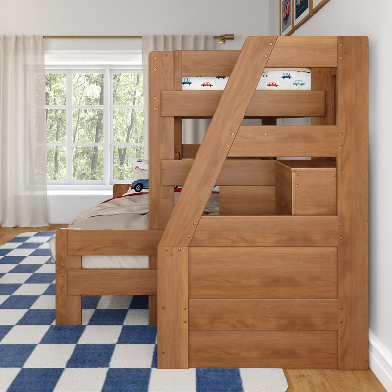 Solid wood kids twin-over-twin bunk bed with ladder and built-in storage in natural finish in a child's bedroom with blue check rug and car-print bedding