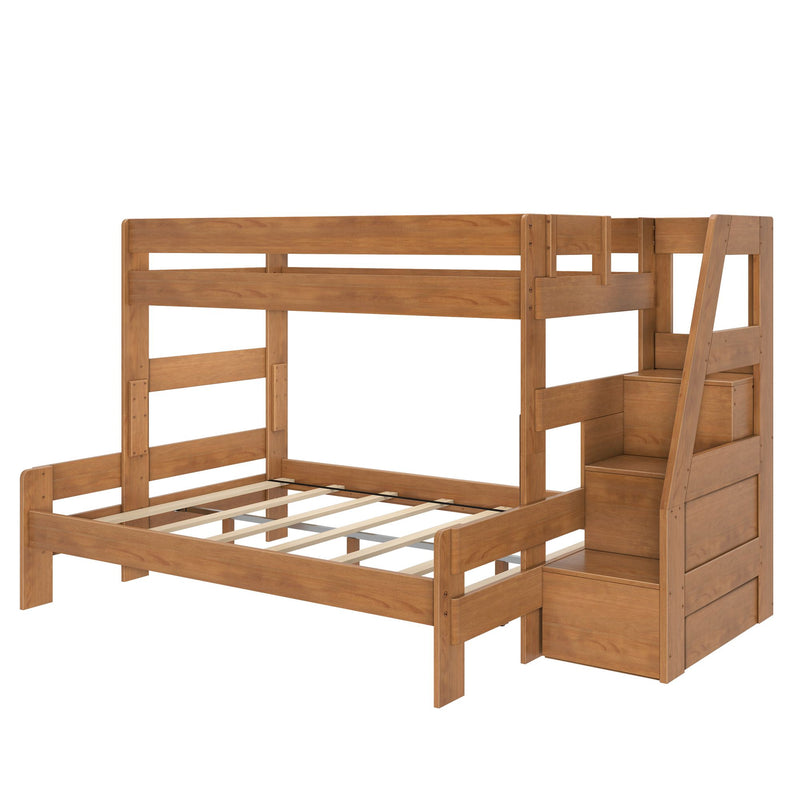Twin-over-full solid wood bunk bed with right-side staircase and built-in storage drawers in warm honey oak finish — space-saving kids bedroom furniture