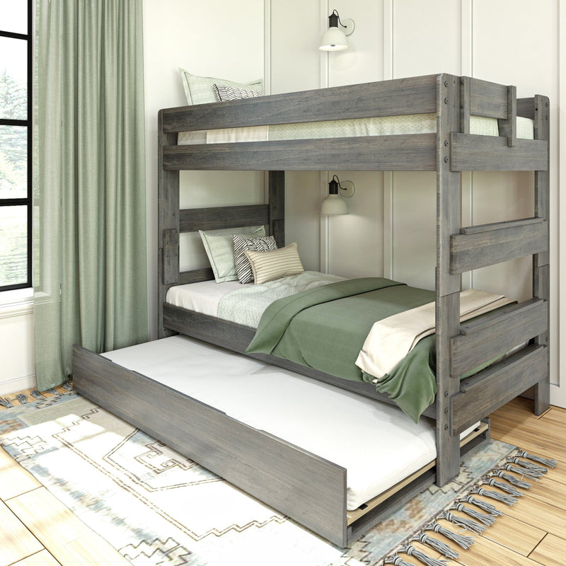 Gray wooden bunk bed with pull-out trundle, sage green bedding and accent pillows in a modern farmhouse kids' bedroom with wall sconces and curtains