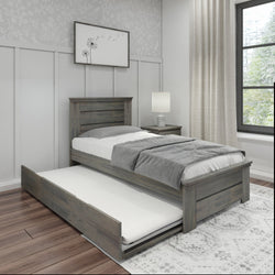 Modern gray wooden single bed with pull-out trundle in a stylish bedroom setting.