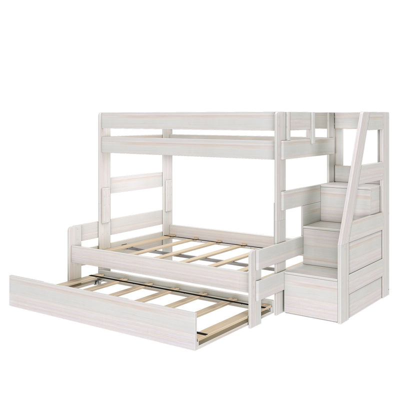 Whitewashed wooden twin-over-full bunk bed with staircase storage and pull-out trundle drawer for kids' bedroom