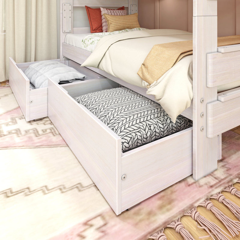 Whitewashed wood bunk bed with under-bed storage drawers and pull-out trundle mattress, neutral beige bedding and patterned pillows in cozy bedroom