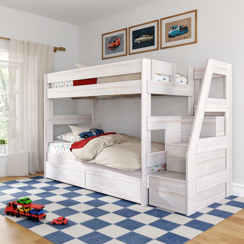 White wooden bunk bed with ladder and under-drawer storage in a children's bedroom, car-themed bedding and framed vintage car prints, blue checkered rug and toy car carrier on hardwood floor