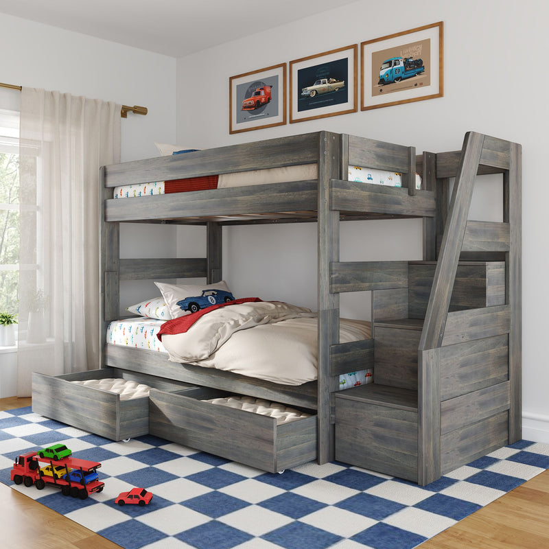 Gray wooden kids bunk bed with ladder and under-bed storage drawers, car-themed bedding, toy cars and framed car prints in a children's room