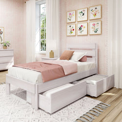 Cozy bedroom with a white platform bed featuring under-bed storage drawers, pink accents, and decorative floral wall art.